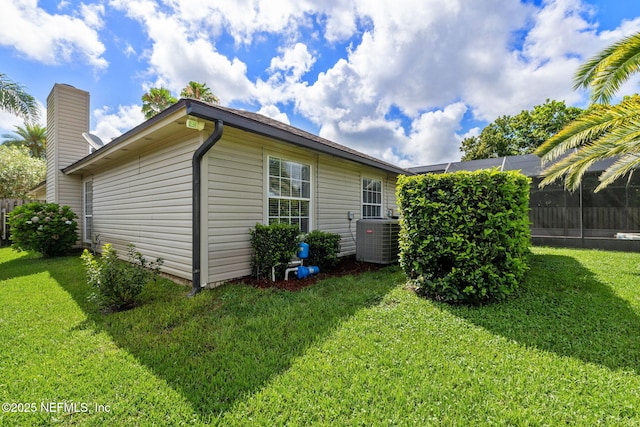 4458 Deep River Way E, Jacksonville, FL 32224 - view of side of property with a yard and a chimney