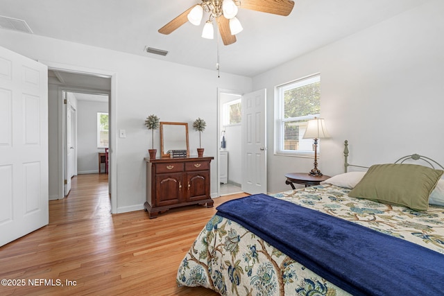 3130 Honeywood Dr, Jacksonville, FL 32277 - bedroom featuring light wood-type flooring, baseboards, and ceiling fan