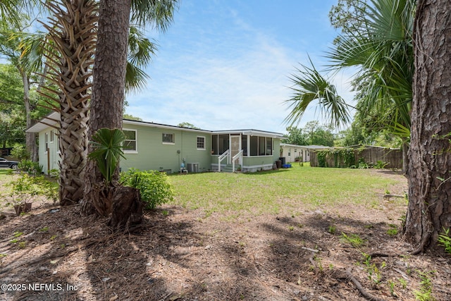 3130 Honeywood Dr, Jacksonville, FL 32277 - view of yard with a sunroom and entry steps