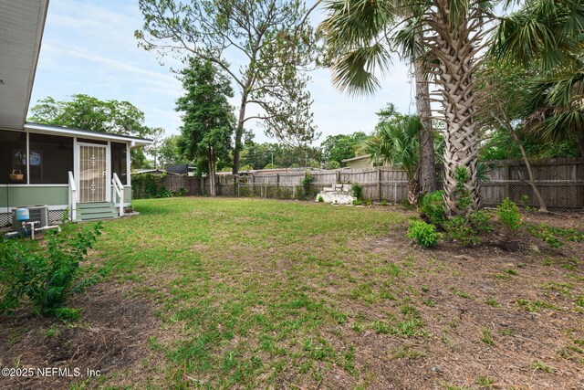 3130 Honeywood Dr, Jacksonville, FL 32277 - view of yard with a sunroom