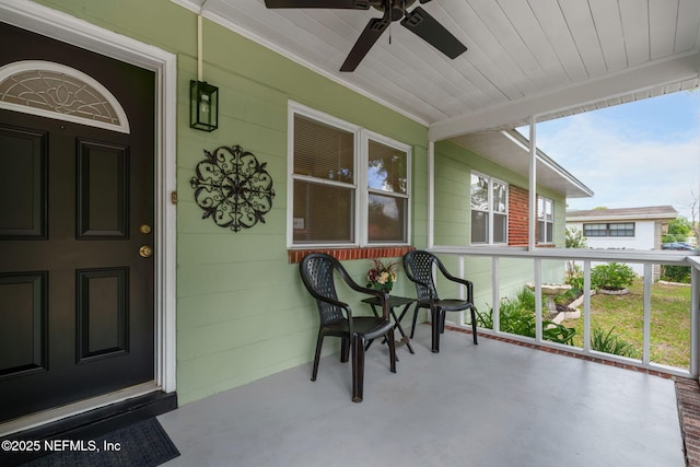 3130 Honeywood Dr, Jacksonville, FL 32277 - sunroom / solarium featuring ceiling fan and concrete flooring