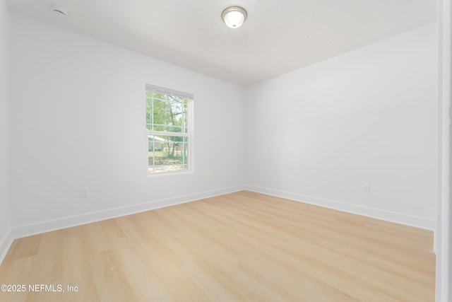 7127 Stetson St, Keystone Heights, FL 32656 - spare room featuring wood finished floors and baseboards