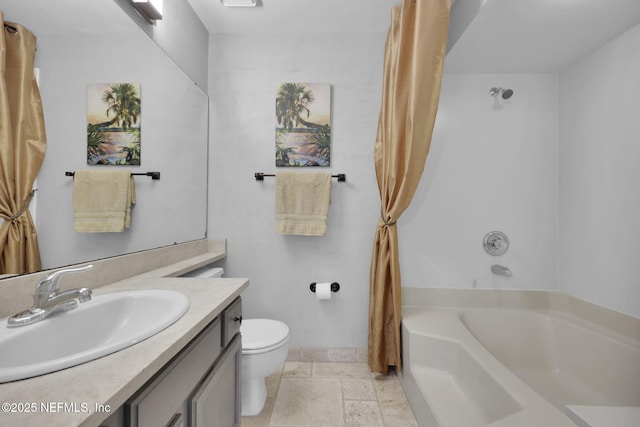 721 Sandy Oaks Ct, Ponte Vedra Beach, FL 32082 - full bath featuring vanity, toilet, stone tile floors, and baseboards