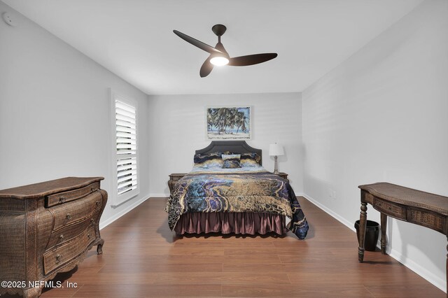 721 Sandy Oaks Ct, Ponte Vedra Beach, FL 32082 - bedroom with baseboards, wood finished floors, and ceiling fan