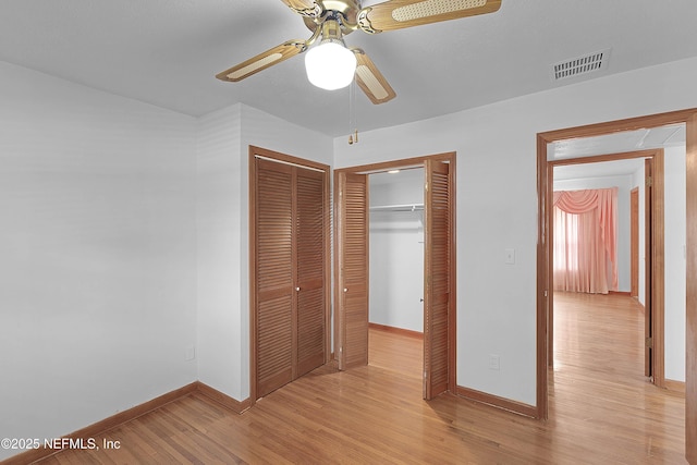 3344 Queen Ann Ln, Jacksonville, FL 32257 - unfurnished bedroom featuring light wood-type flooring and ceiling fan