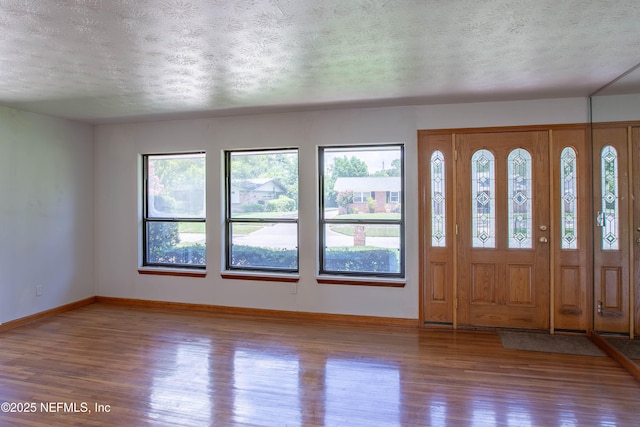 3344 Queen Ann Ln, Jacksonville, FL 32257 - entrance foyer featuring wood finished floors and a textured ceiling