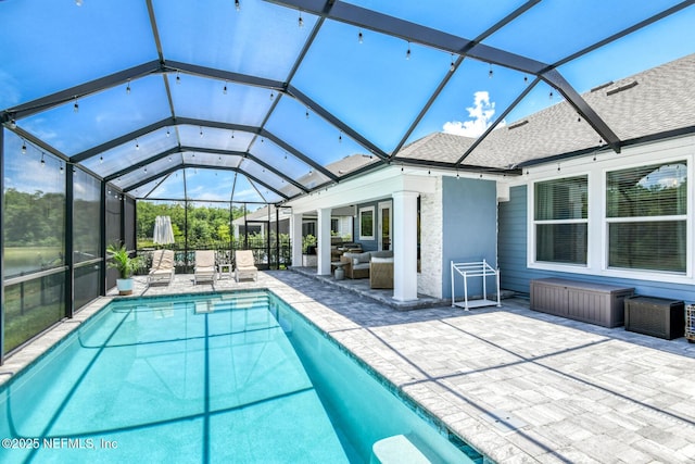 843 Windley Dr, Saint Augustine, FL 32092 - swimming pool featuring a patio, glass enclosure, and an outdoor hangout area