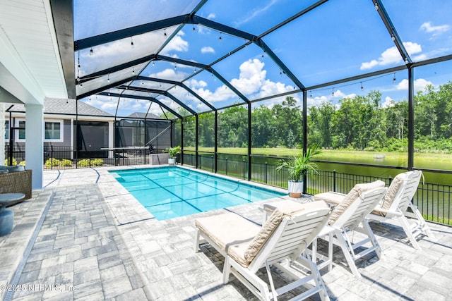 843 Windley Dr, Saint Augustine, FL 32092 - view of pool with a patio, a water view, and glass enclosure