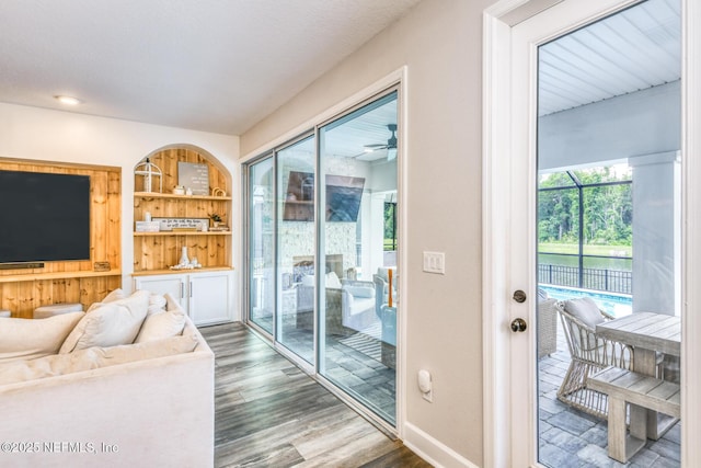 843 Windley Dr, Saint Augustine, FL 32092 - living room with wood finished floors, a ceiling fan, and baseboards