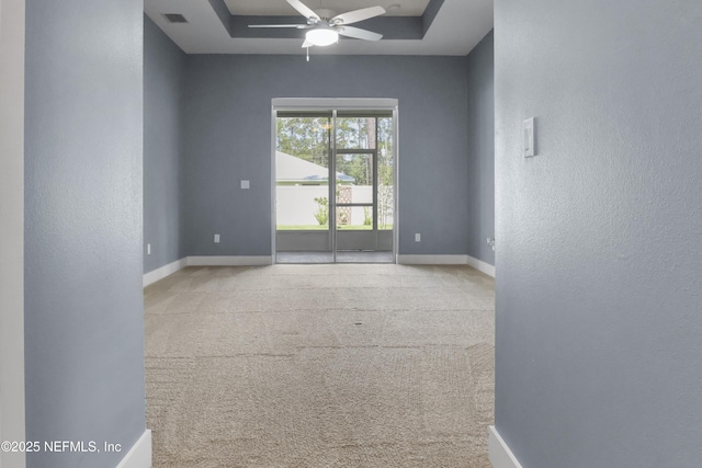 11 Woodstone Ln, Palm Coast, FL 32164 - empty room featuring baseboards, ceiling fan, a textured wall, and carpet