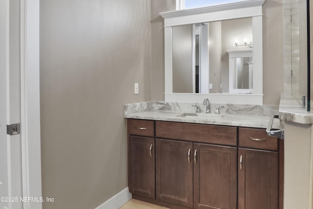 11 Woodstone Ln, Palm Coast, FL 32164 - bathroom featuring vanity and baseboards
