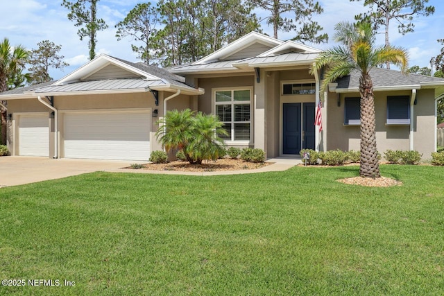 11 Woodstone Ln, Palm Coast, FL 32164 - view of front facade featuring a standing seam roof, stucco siding, a garage, and concrete driveway