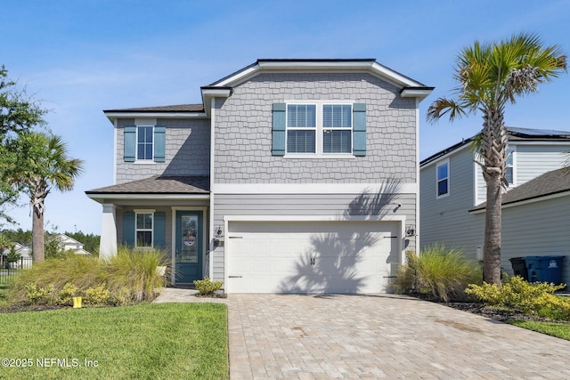 70 Creekmore Dr, Saint Augustine, FL 32092 - traditional home featuring an attached garage and driveway