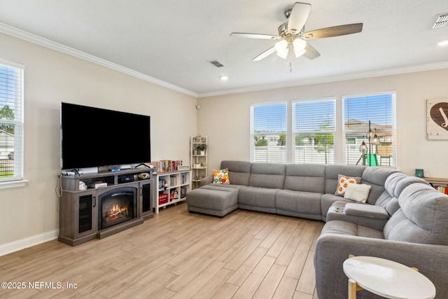 70 Creekmore Dr, Saint Augustine, FL 32092 - living area featuring light wood-style flooring, plenty of natural light, ornamental molding, a ceiling fan, and recessed lighting