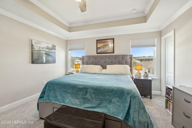 70 Creekmore Dr, Saint Augustine, FL 32092 - bedroom featuring light carpet, ornamental molding, a raised ceiling, and a ceiling fan