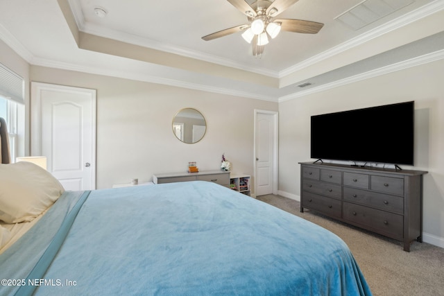 70 Creekmore Dr, Saint Augustine, FL 32092 - carpeted bedroom featuring a raised ceiling, crown molding, and ceiling fan