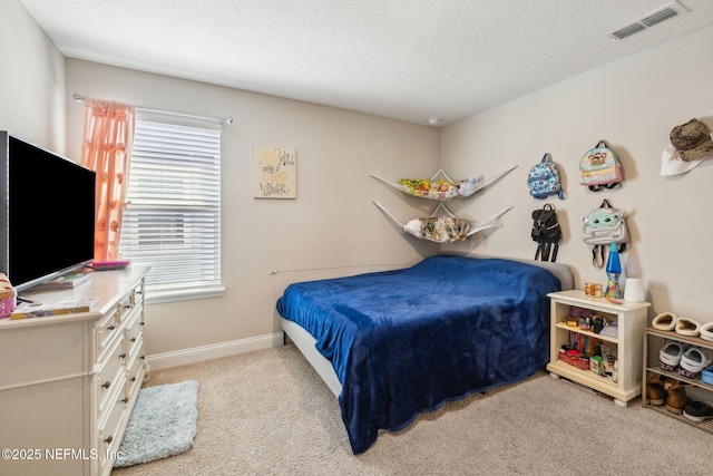 70 Creekmore Dr, Saint Augustine, FL 32092 - bedroom with light colored carpet and a textured ceiling