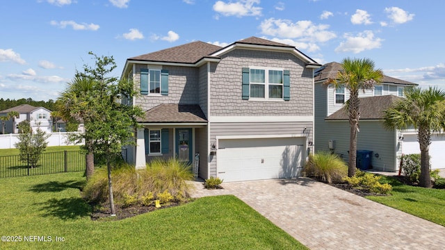 70 Creekmore Dr, Saint Augustine, FL 32092 - view of front of home featuring decorative driveway and a garage