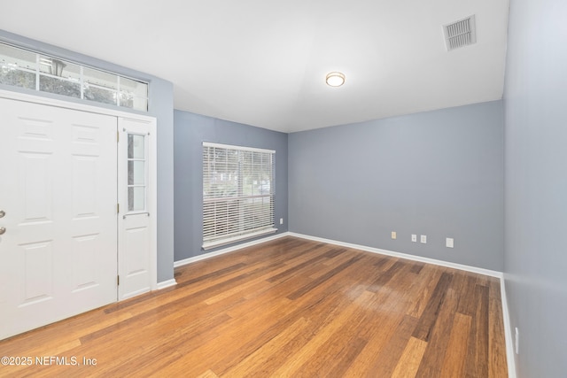 2007 Hollington Dr, Jacksonville, FL 32246 - foyer entrance with wood finished floors and baseboards