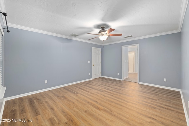 2007 Hollington Dr, Jacksonville, FL 32246 - empty room featuring a ceiling fan, baseboards, light wood finished floors, crown molding, and a textured ceiling
