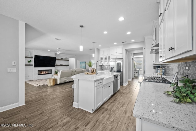 83 Tortola Way, Saint Johns, FL 32259 - kitchen featuring appliances with stainless steel finishes, open floor plan, recessed lighting, wood finished floors, and ceiling fan