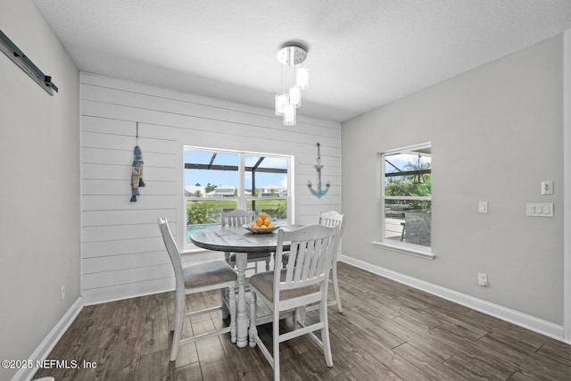 83 Tortola Way, Saint Johns, FL 32259 - dining area with dark wood finished floors and a barn door