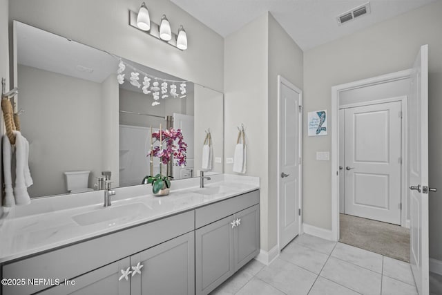 83 Tortola Way, Saint Johns, FL 32259 - full bath with double vanity, tile patterned floors, and a shower