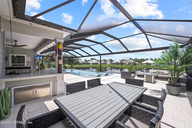 83 Tortola Way, Saint Johns, FL 32259 - view of patio / terrace featuring outdoor dining space, an outdoor pool, exterior kitchen, a water view, and ceiling fan