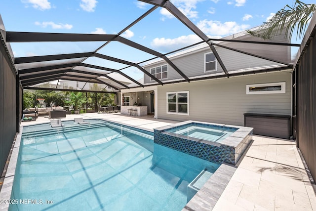 83 Tortola Way, Saint Johns, FL 32259 - view of pool featuring outdoor lounge area, a patio, a pool with connected hot tub, and glass enclosure