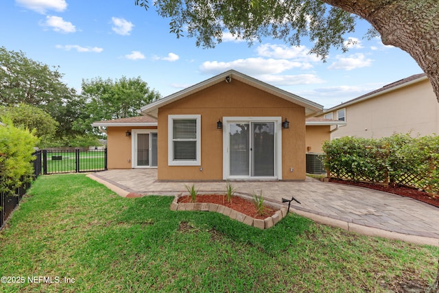 1101 Chokee Pl, Saint Augustine, FL 32092 - rear view of house with stucco siding, a patio area, and cooling unit