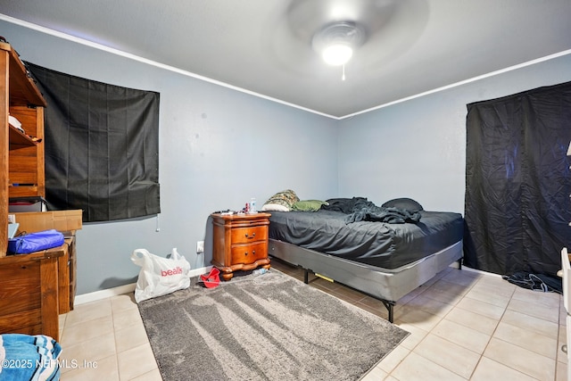 665 Grove Park Blvd, Jacksonville, FL 32216 - bedroom with tile patterned floors, ceiling fan, and crown molding