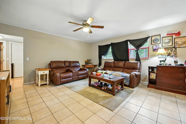 665 Grove Park Blvd, Jacksonville, FL 32216 - living room featuring ceiling fan and light tile patterned flooring