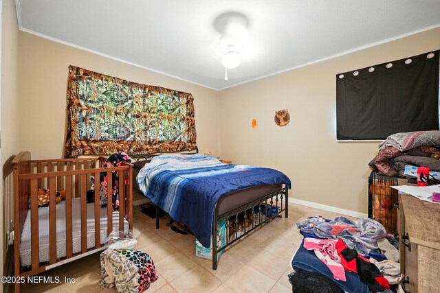 665 Grove Park Blvd, Jacksonville, FL 32216 - bedroom featuring crown molding and baseboards