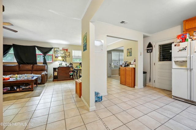 665 Grove Park Blvd, Jacksonville, FL 32216 - living room with light tile patterned flooring and ceiling fan