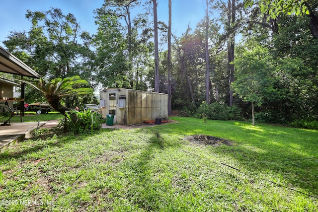 665 Grove Park Blvd, Jacksonville, FL 32216 - view of green lawn with a shed