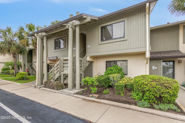 97 Village Las Palmas Cir, Saint Augustine, FL 32080 - view of building exterior with stairs