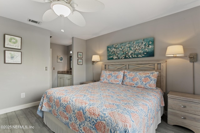 97 Village Las Palmas Cir, Saint Augustine, FL 32080 - bedroom with wood finished floors, baseboards, and a ceiling fan