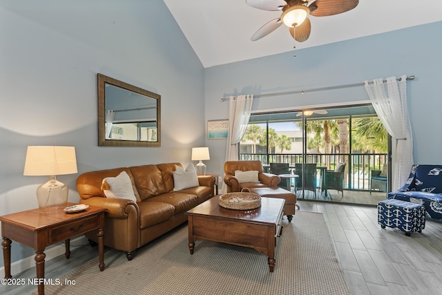 97 Village Las Palmas Cir, Saint Augustine, FL 32080 - living area with a ceiling fan, wood finished floors, and high vaulted ceiling