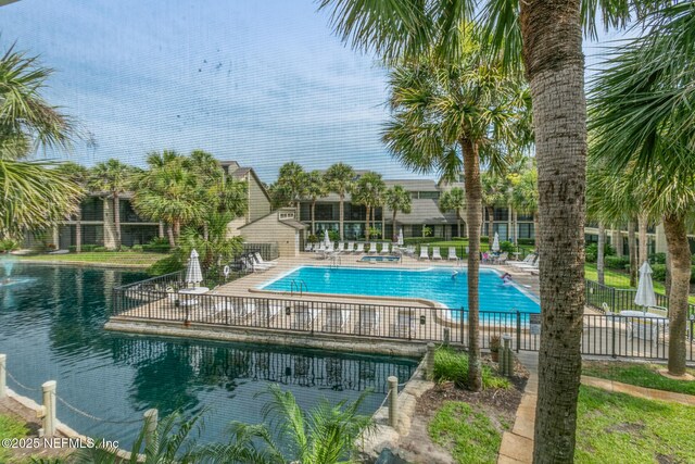 97 Village Las Palmas Cir, Saint Augustine, FL 32080 - community pool featuring a patio