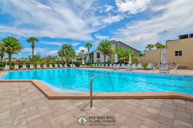 97 Village Las Palmas Cir, Saint Augustine, FL 32080 - community pool with a patio