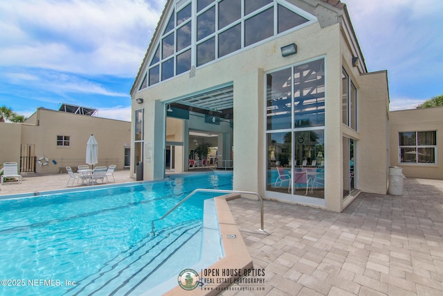 97 Village Las Palmas Cir, Saint Augustine, FL 32080 - community pool featuring a patio