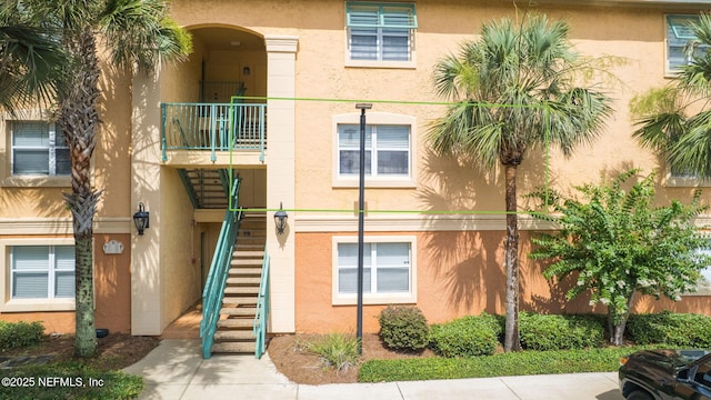 108 Laguna Villas Blvd Unit D22, Jacksonville Beach, FL 32250 - view of property featuring stairway