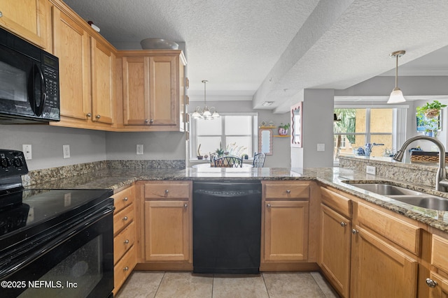 108 Laguna Villas Blvd Unit D22, Jacksonville Beach, FL 32250 - kitchen featuring black appliances, a sink, crown molding, stone counters, and decorative light fixtures