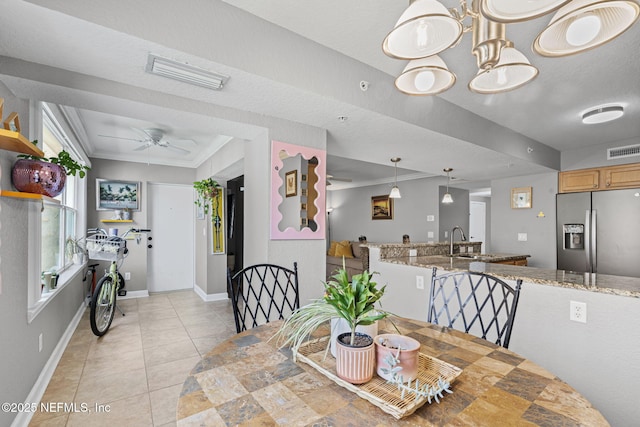 108 Laguna Villas Blvd Unit D22, Jacksonville Beach, FL 32250 - dining room featuring baseboards, a ceiling fan, light tile patterned flooring, and ornamental molding