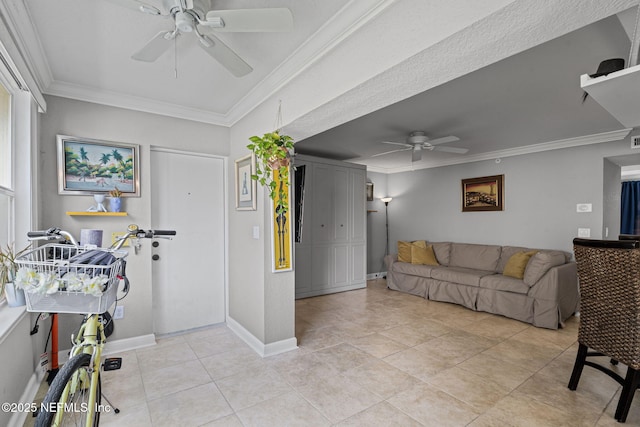 108 Laguna Villas Blvd Unit D22, Jacksonville Beach, FL 32250 - living room with ceiling fan, ornamental molding, light tile patterned floors, and baseboards
