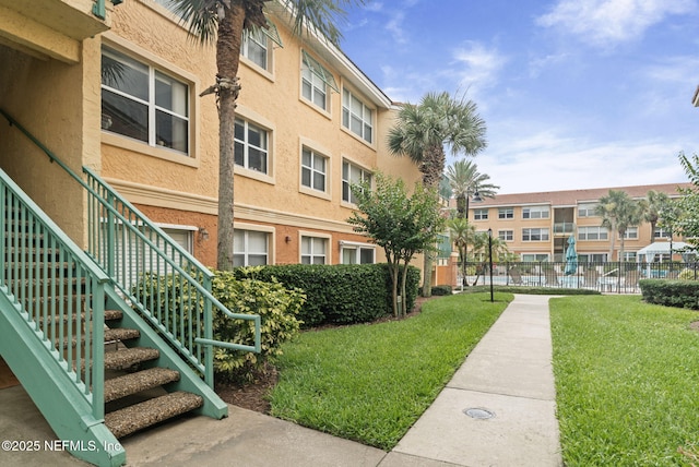 108 Laguna Villas Blvd Unit D22, Jacksonville Beach, FL 32250 - view of property's community featuring stairs and a residential view