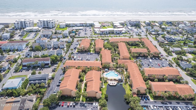 108 Laguna Villas Blvd Unit D22, Jacksonville Beach, FL 32250 - aerial view of property and surrounding area with unending shoreline and a pool area