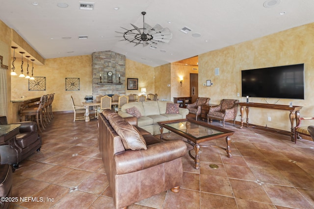 108 Laguna Villas Blvd Unit D22, Jacksonville Beach, FL 32250 - tiled living area featuring vaulted ceiling, a ceiling fan, and baseboards