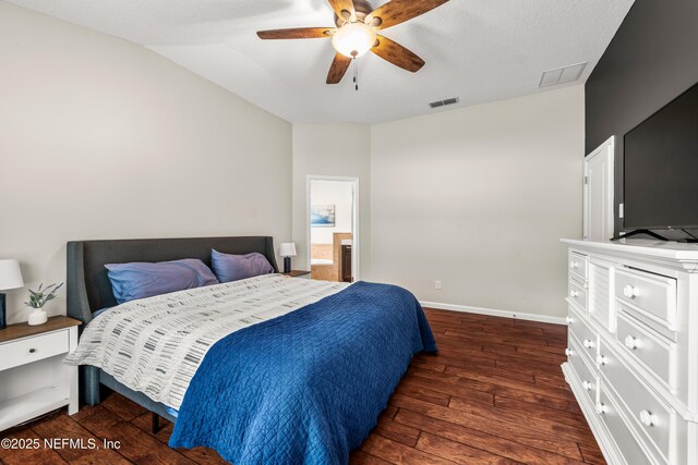81014 Lockhaven Dr, Yulee, FL 32097 - bedroom with wood-type flooring, vaulted ceiling, baseboards, and a ceiling fan