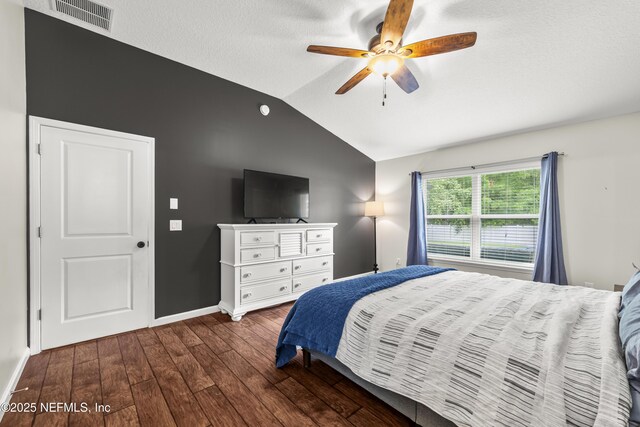 81014 Lockhaven Dr, Yulee, FL 32097 - bedroom with vaulted ceiling, wood finished floors, baseboards, and a ceiling fan